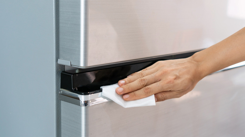 Person polishing stainless steel