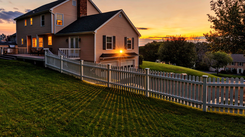 Colonial home in sunset