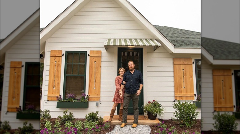 Napiers in front of cottage