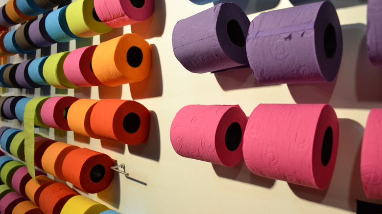 many rolls of colorful toilet paper