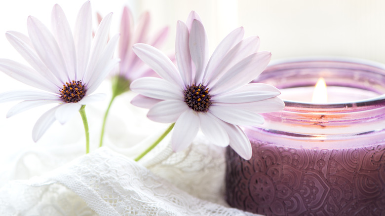 Flowers on taper candles