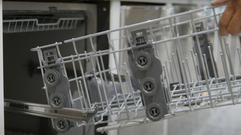 gray dishwasher rack with three adjustment levels