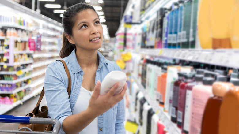 woman buying toiletries