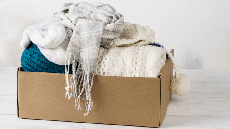 brown box of winter scarves
