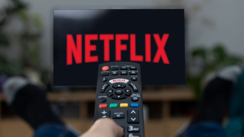 Netflix on screen with remote