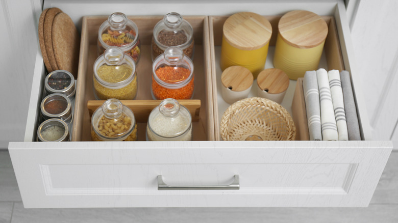 open drawer with food jars