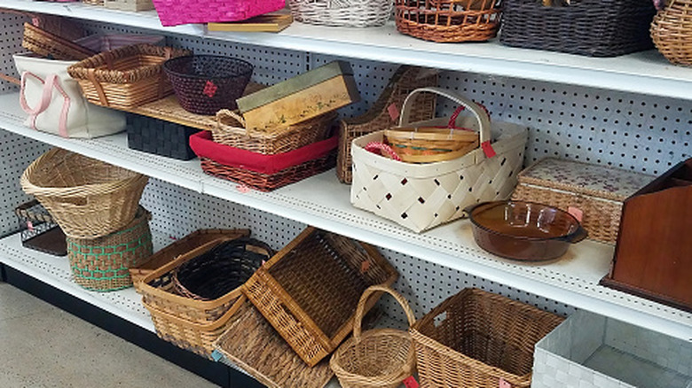 Different types of baskets on a display at a thrift store