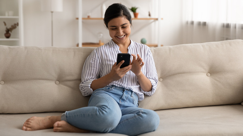 Woman relaxing on couch