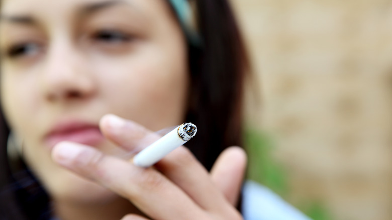 A woman smoking a cigarette