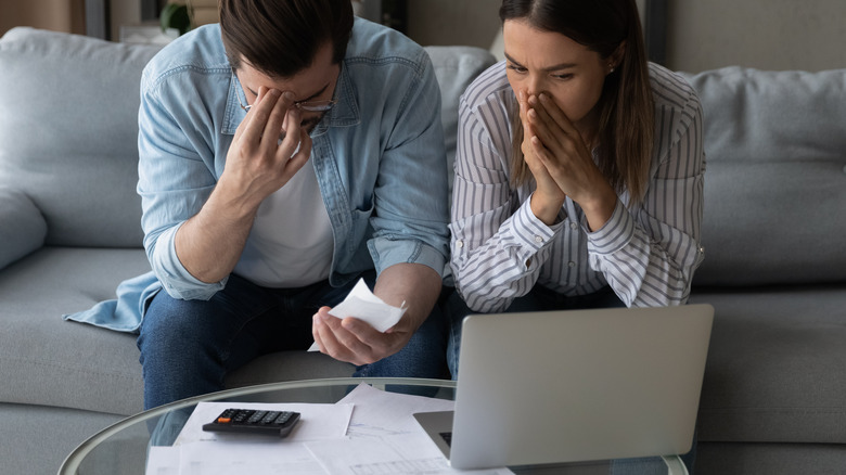 Couple looking worried