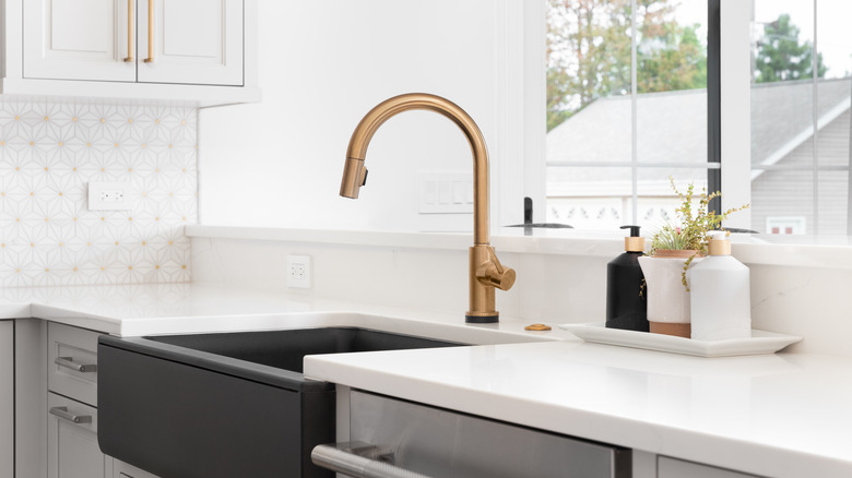 kitchen sink with granite counter