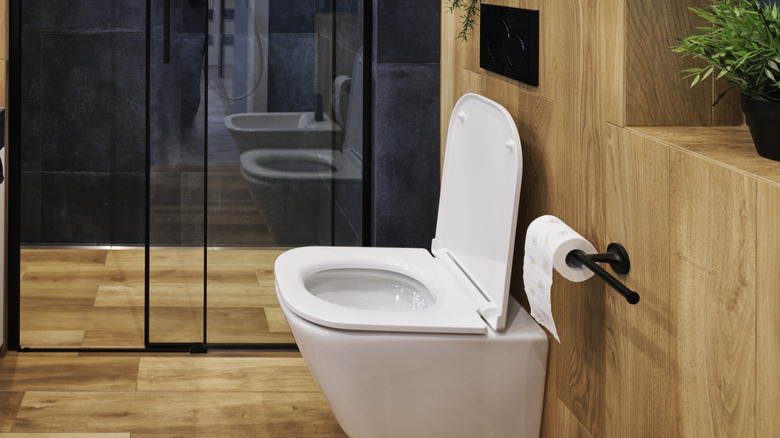 modern bathroom wooden with toilet 