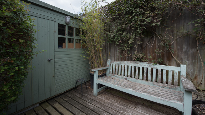 Shed next to wooden deck