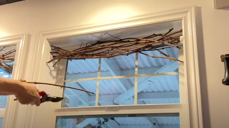 Grapevine branches being used as a window topper