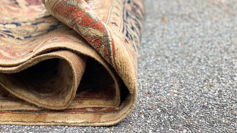 Rolled up rug outdoors