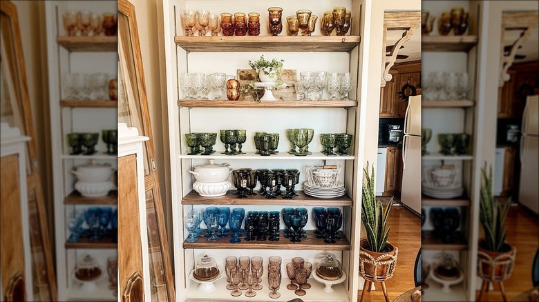 colored glassware on shelves