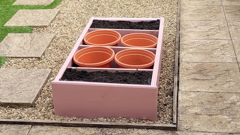 pink bookcase garden bed