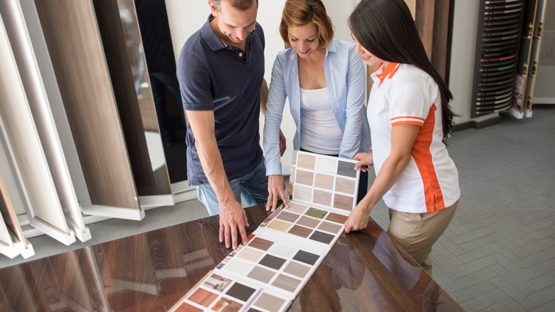 Couple looking at flooring options