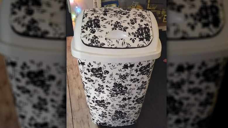 Trashcan with floral print shelf paper