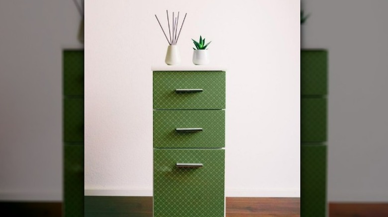 File cabinet with green contact paper