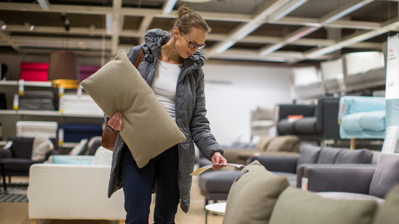 Woman shopping for sofa