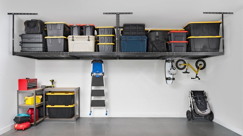 organized garage with overhead storage racks