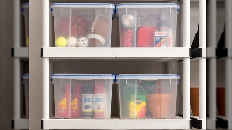 plastic bins stacked on shelves