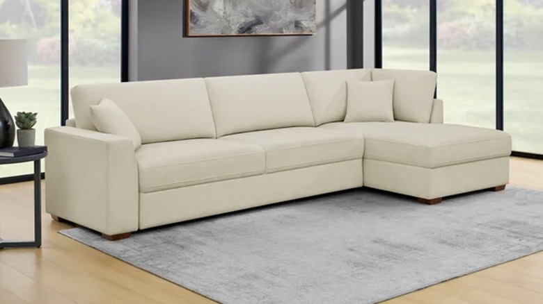 Thomasville beige sofa sectional from Costco in living room