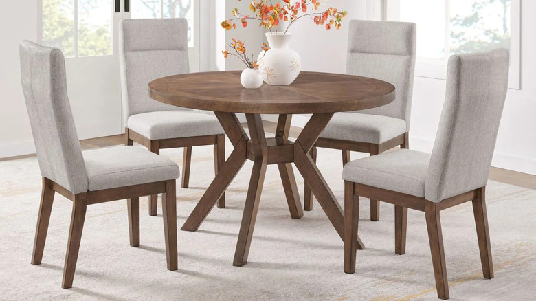 A modern beige and brown dining set for 4