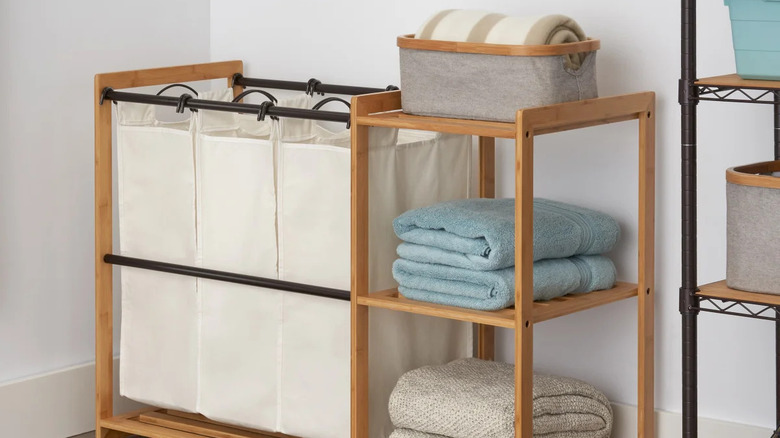 Removeable divided laundry bags in bamboo shelf station