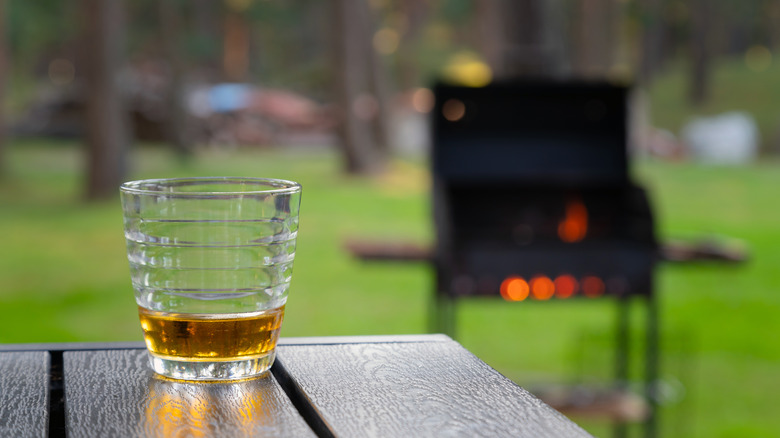 Whiskey, barbecue, and green yard