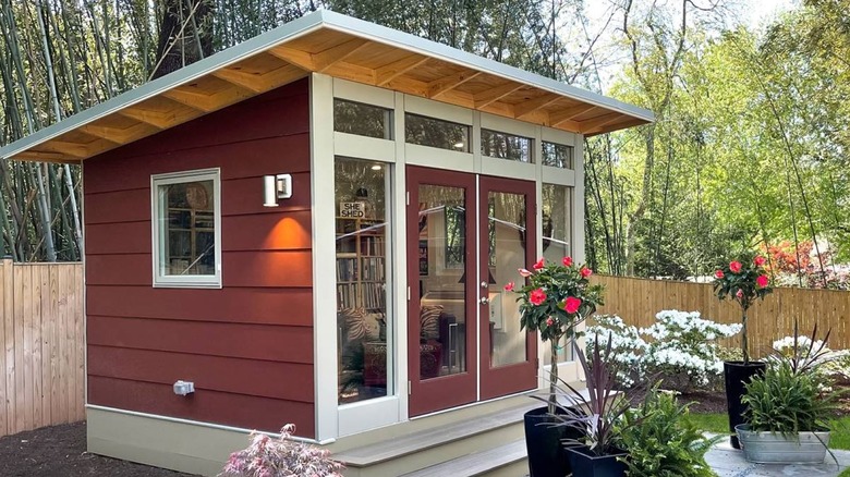 A prefab shed from Costco in a backyard