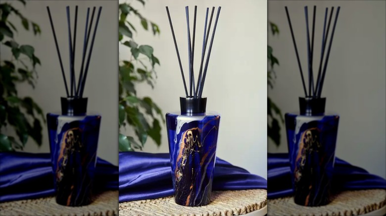 Blue costco oil diffuser with reeds