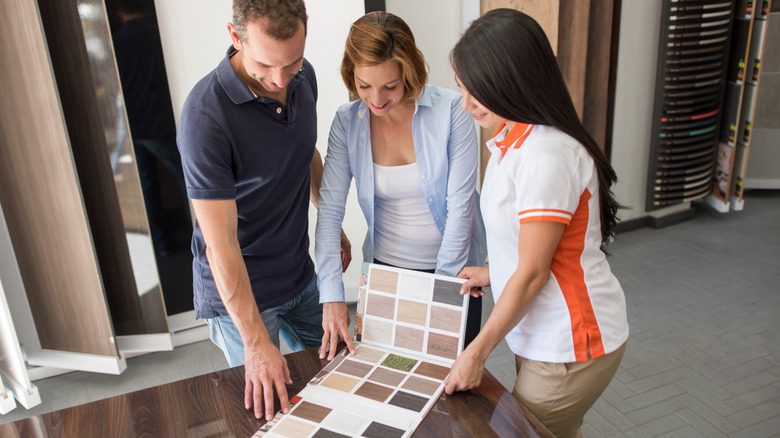 Couple looking at flooring samples