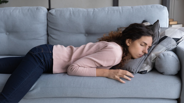 Woman sleeping on the couch