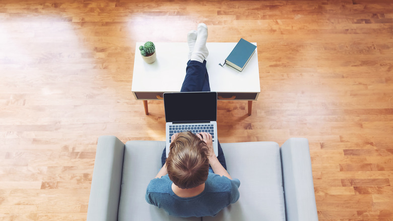 person on a small couch