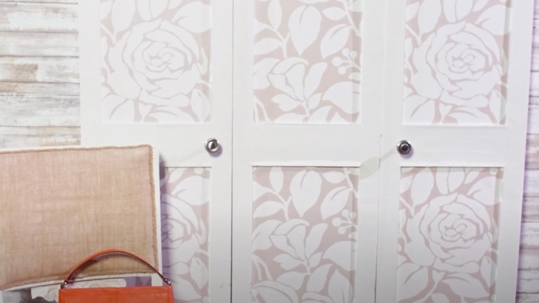 Closet doors covered in peel and stick wallpaper