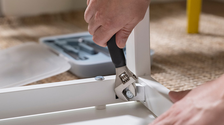 IKEA adjustable wrench with full tool set in background