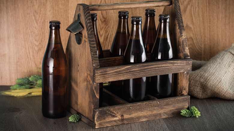 Beer caddy with bottles in it