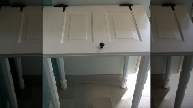 white repurposed cabinet table