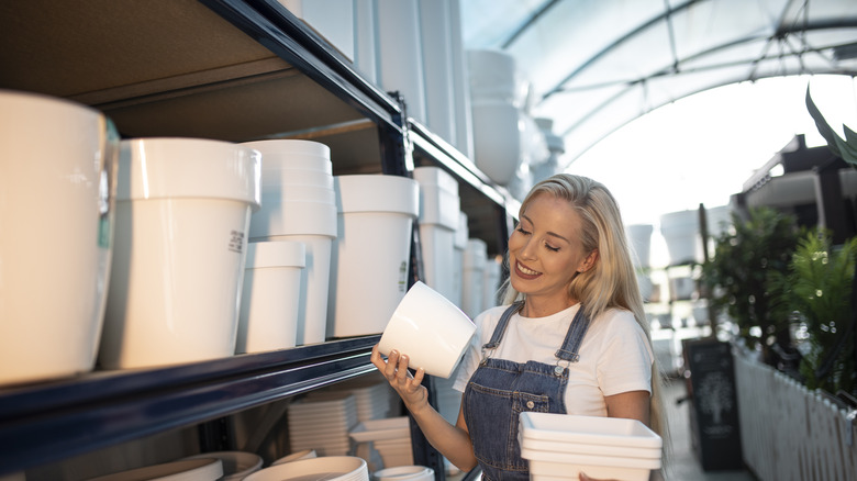 woman shopping for planters