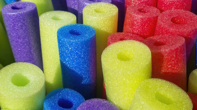 Different colored pool noodles