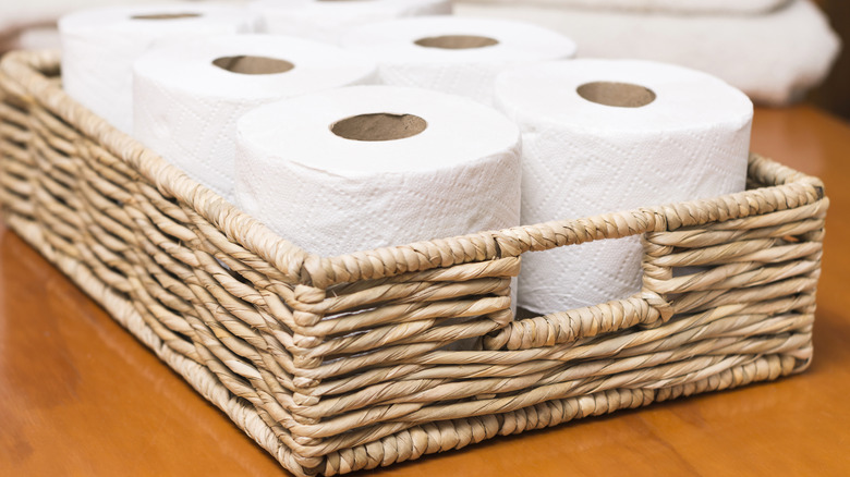 toilet paper in woven basket