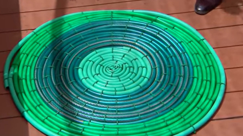 Rug made from garden hoses