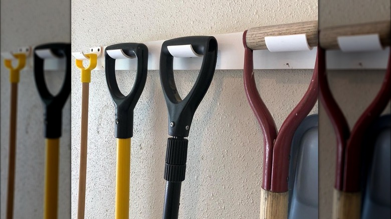 PVC piping shovel hanger