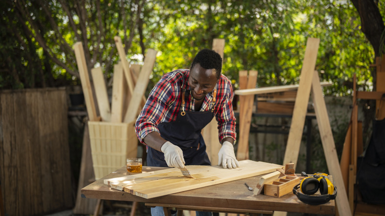 Someone working on an outdoor DIY