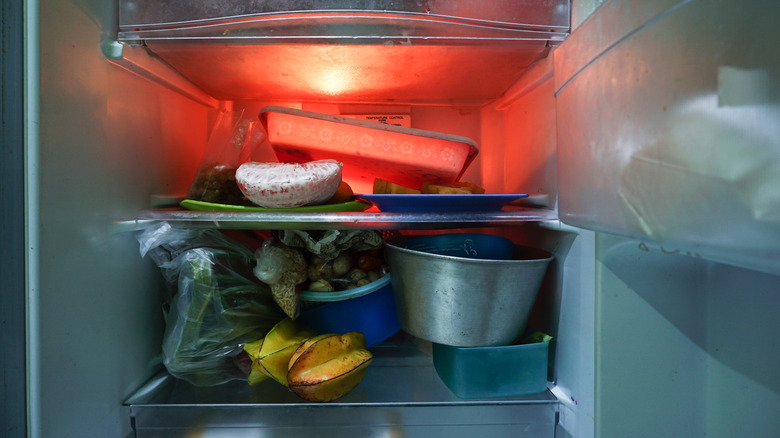 Disorganized fridge shelf