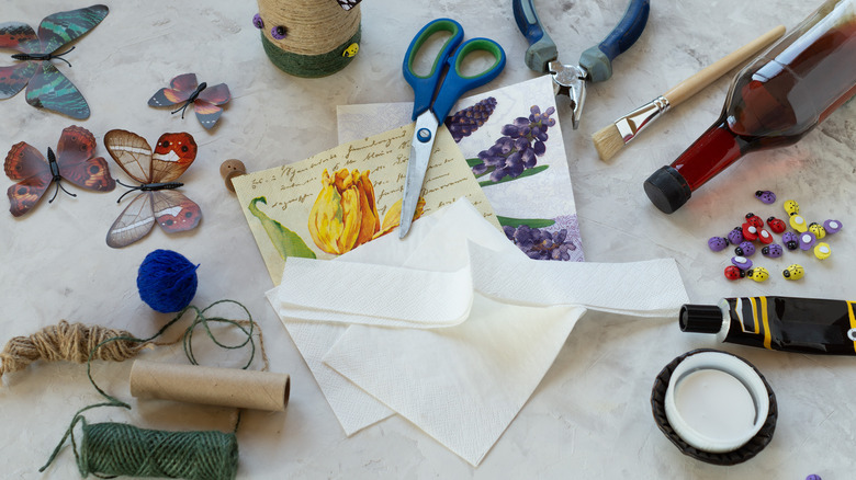 craft table with decoupage supplies