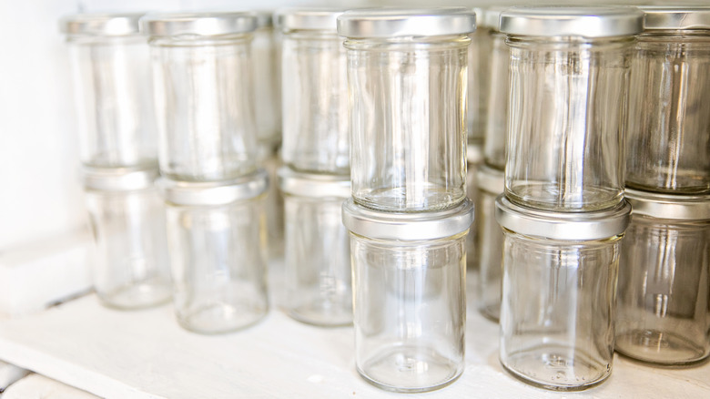 A collection of empty glass jars