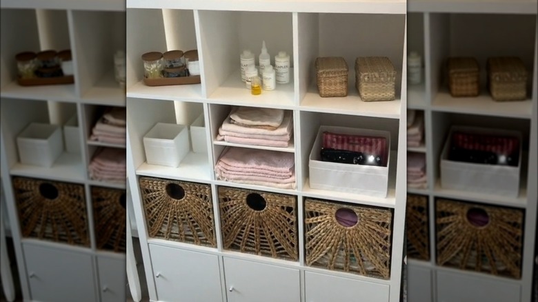 Organized Kallax shelving in bathroom